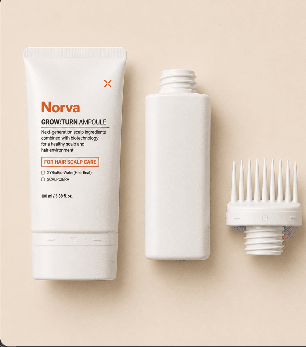 The Norva tube beside its inner bottle and the comb cap that screws onto it
